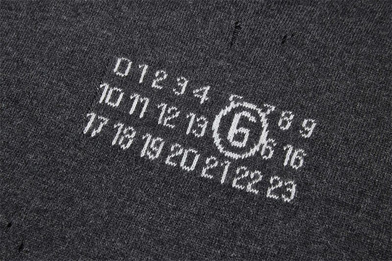 메종마르지엘라 누메릭 울 스웨터