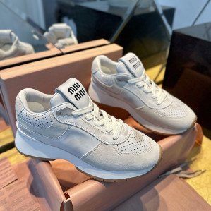 미우미우 퍼퍼레이터드 로우 탑 스니커즈